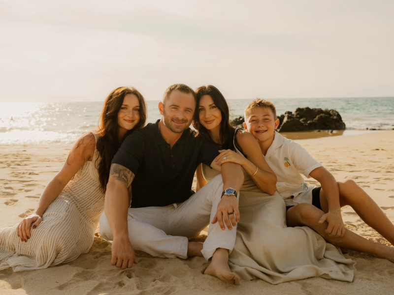 Glenn and family on a beach