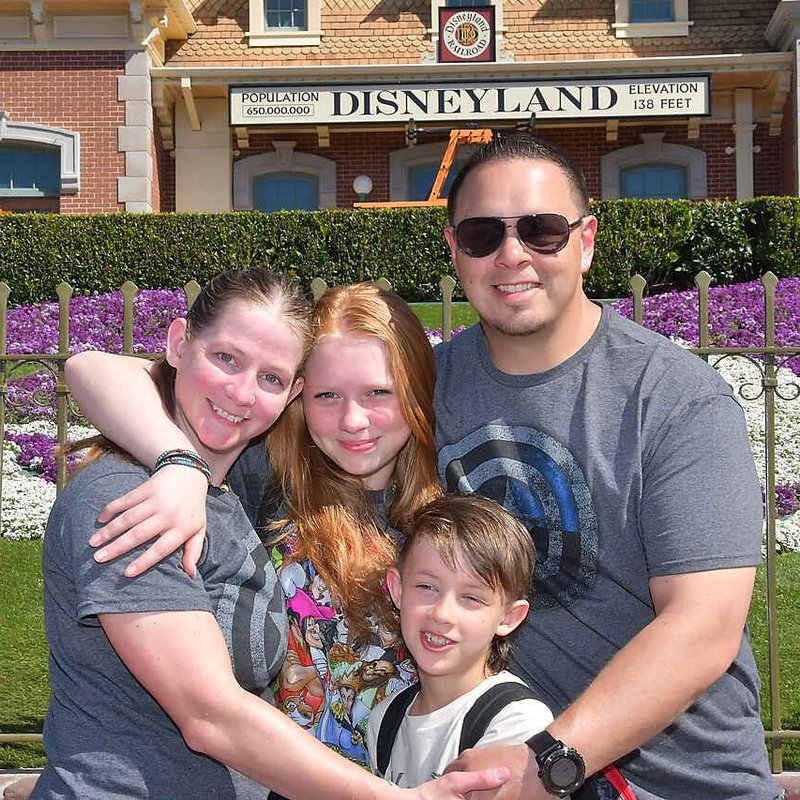 Whitney and family at Disneyland