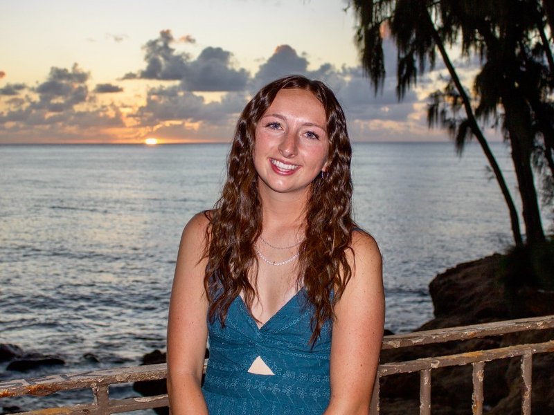 Lexi near the ocean sunset
