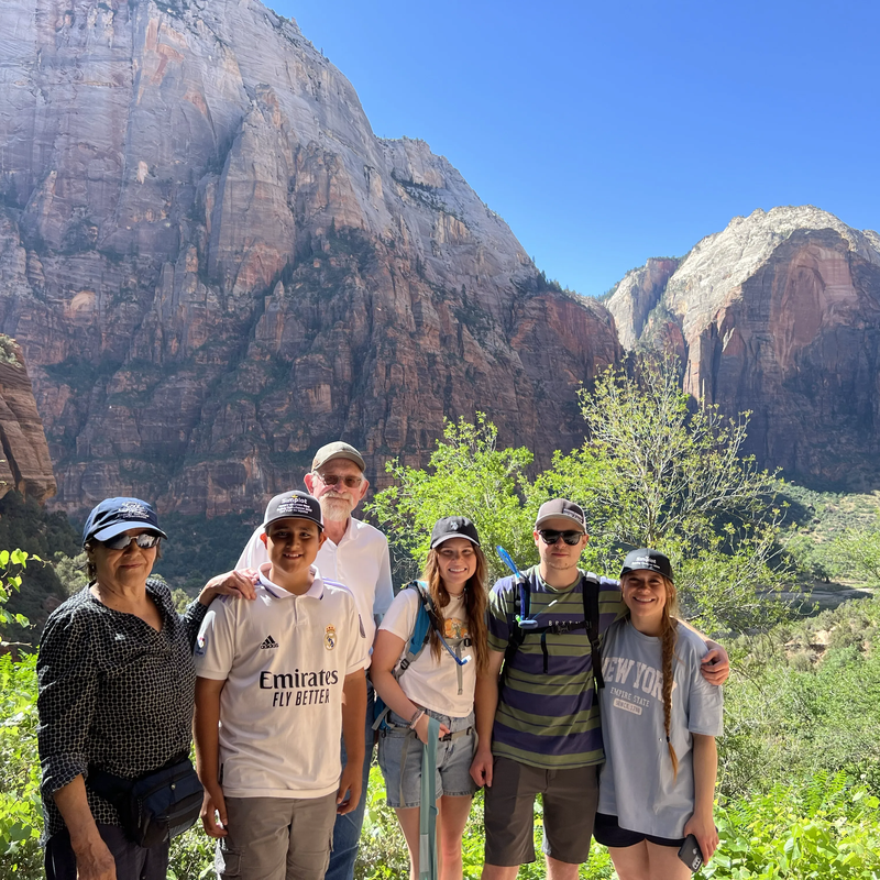 Cory and family on a scenic hike