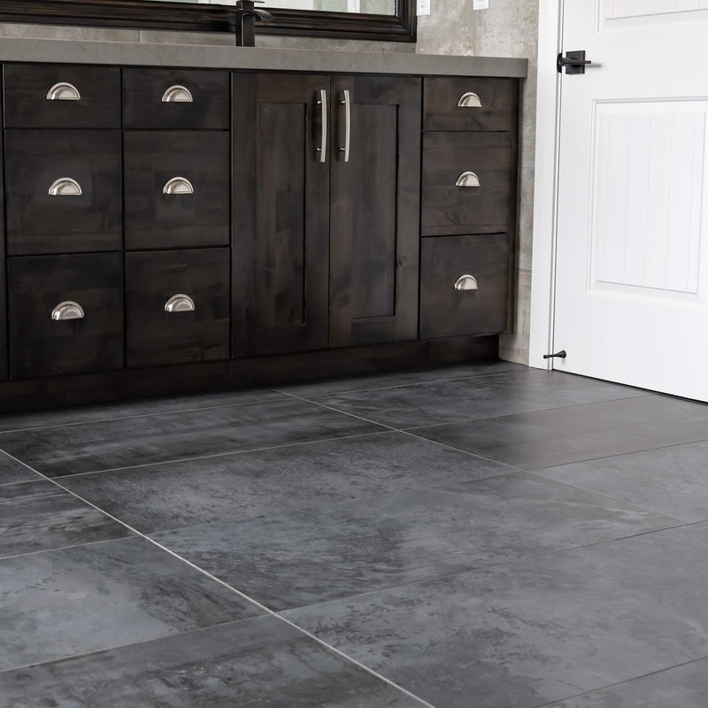 Smoky grey tile flooring in a modern bathroom