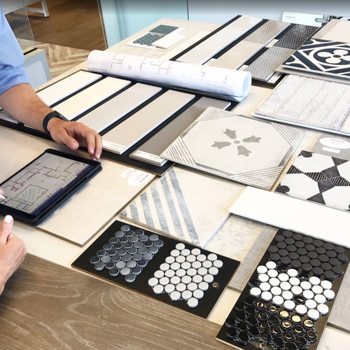 Exploring flooring and design samples in a St George UT Showroom