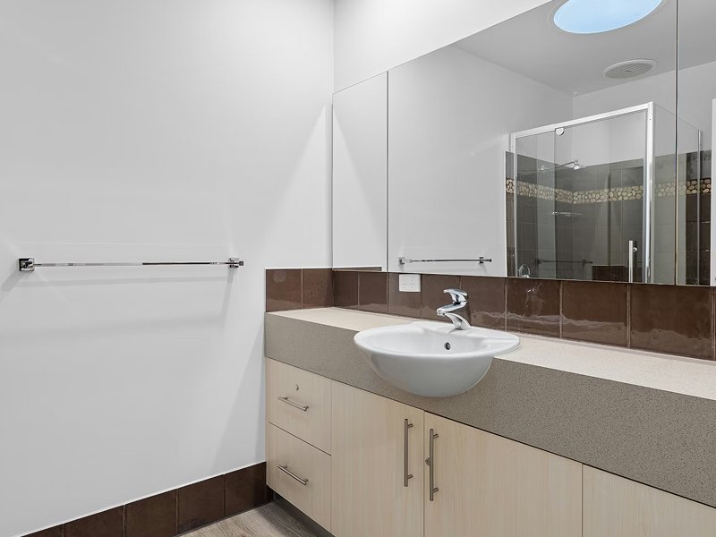 Large game room with warm laminate flooring