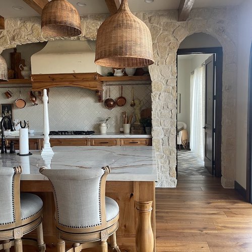 Rustic kitchen in Utah with hardwood flooring