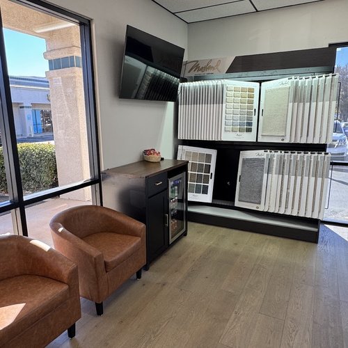 Seating area in a bright flooring showroom in Hurricane