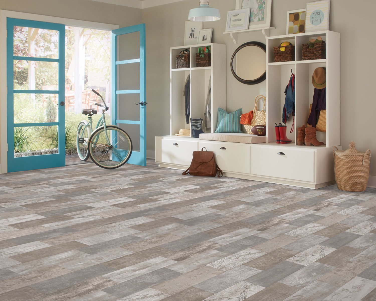 Luxury Vinyl flooring in a beach-themed décor at Pioneer Floor Coverings