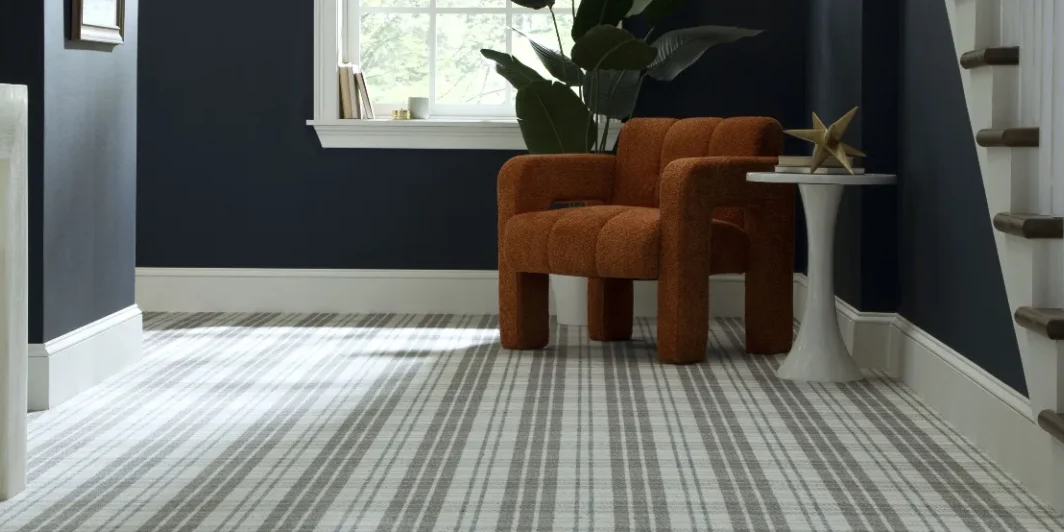 Karastan Black Label plaid carpet flooring in a stylish home entrance