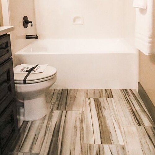 Gorgeous bathroom flooring at 'The Falabella' from Pioneer Floor Coverings & Design