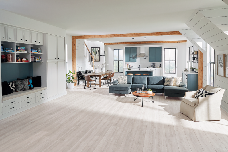 Open concept house with light hardwood flooring